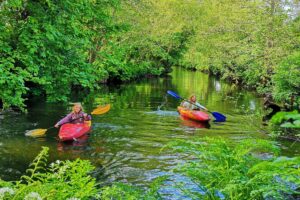 Kayaking on the river at Bush Farm